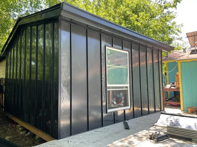 Black standing seam metal wall panels for Metal Roof Installation in Essex